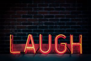 laugh and tell a joke